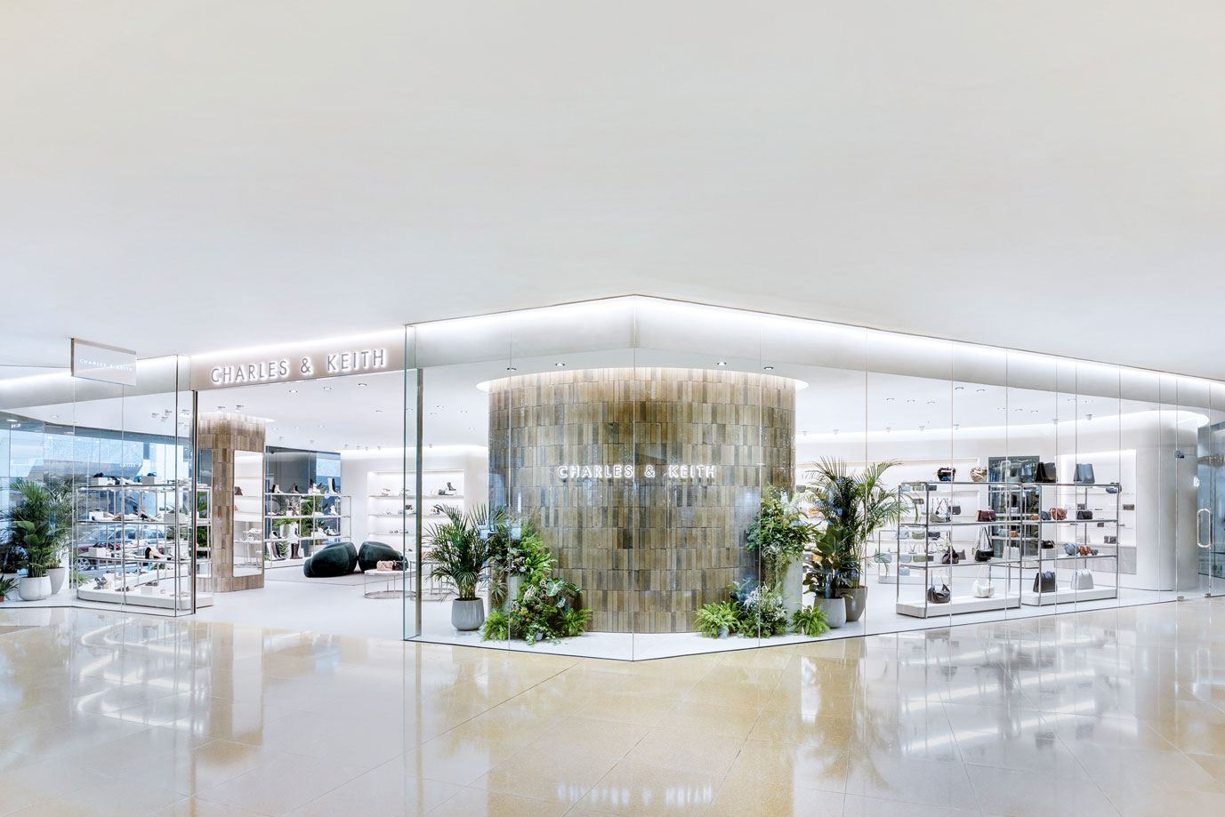 Unique to this 197 square metre CHARLES & KEITH store in Cityplaza, glazed ceramic tiles with a handmade finish line its feature walls, reminiscent of traditional high rise apartment facades in Hong Kong – an ode to the city, which has long been regarded as one of the most fashion forward in the world.